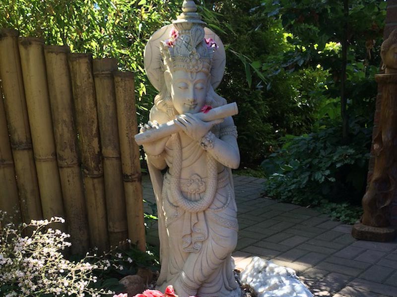 Krishna in der Gartengestaltung